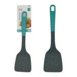 Espátula de plástico con diseño en puntos grises